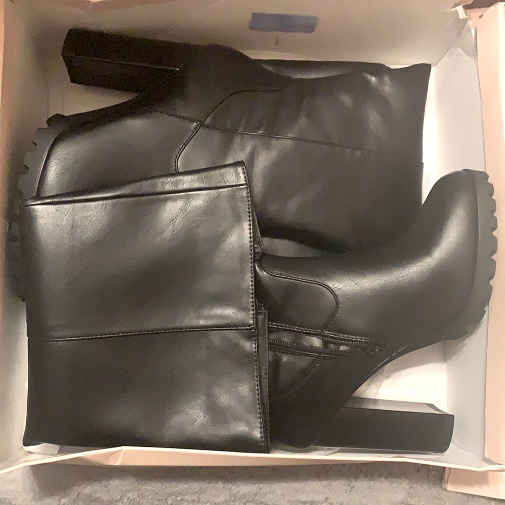 Brand new black heel boots